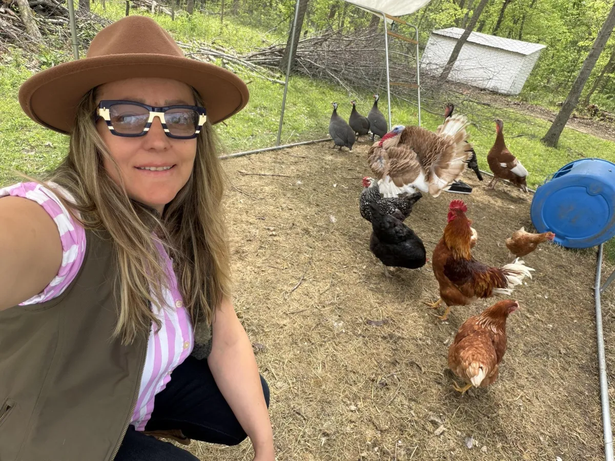 Selfie with chickens and turkeys.