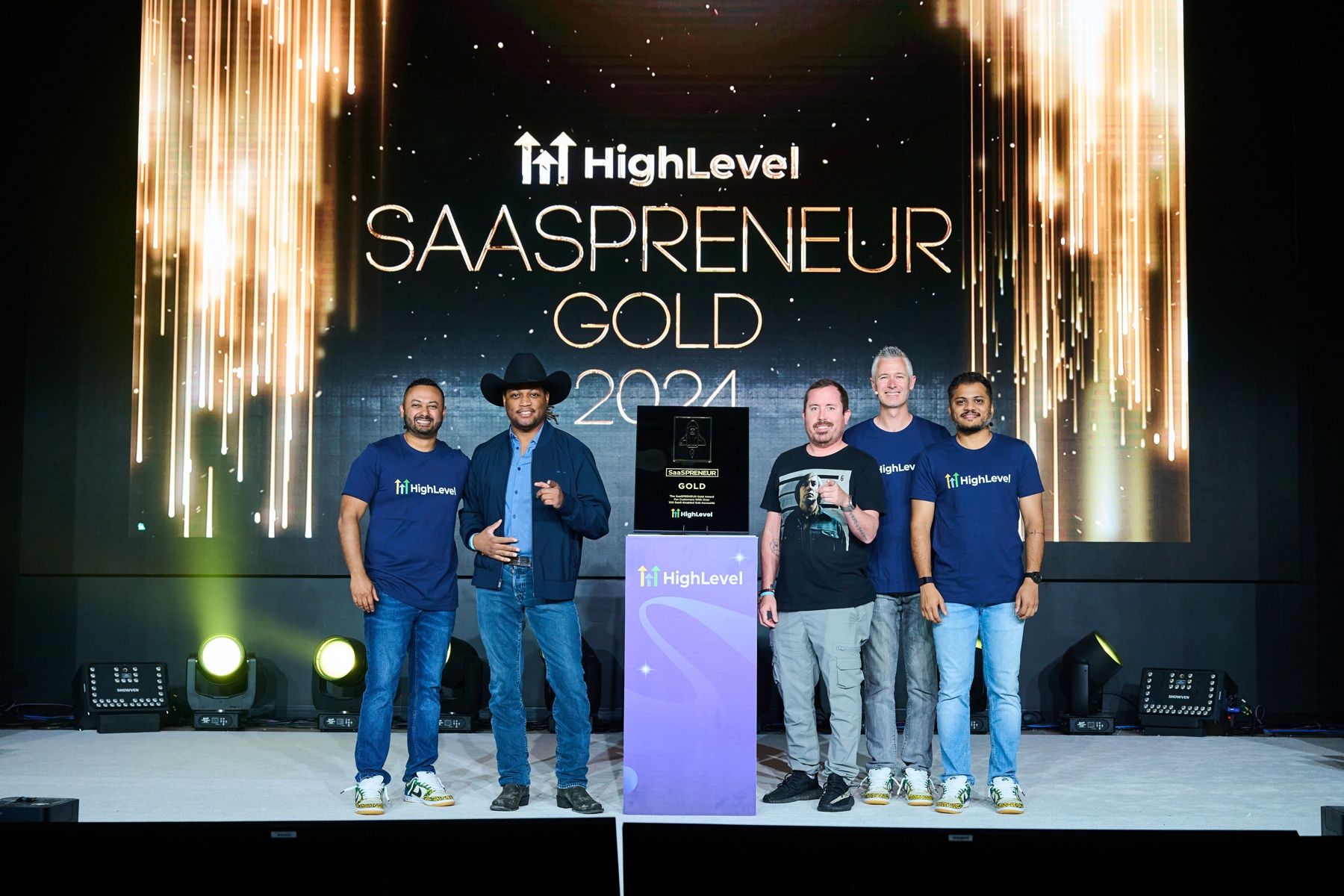Brad Sipperley with the owners of Go High Level winning the Gold SaaSpreneur Award in 2024.