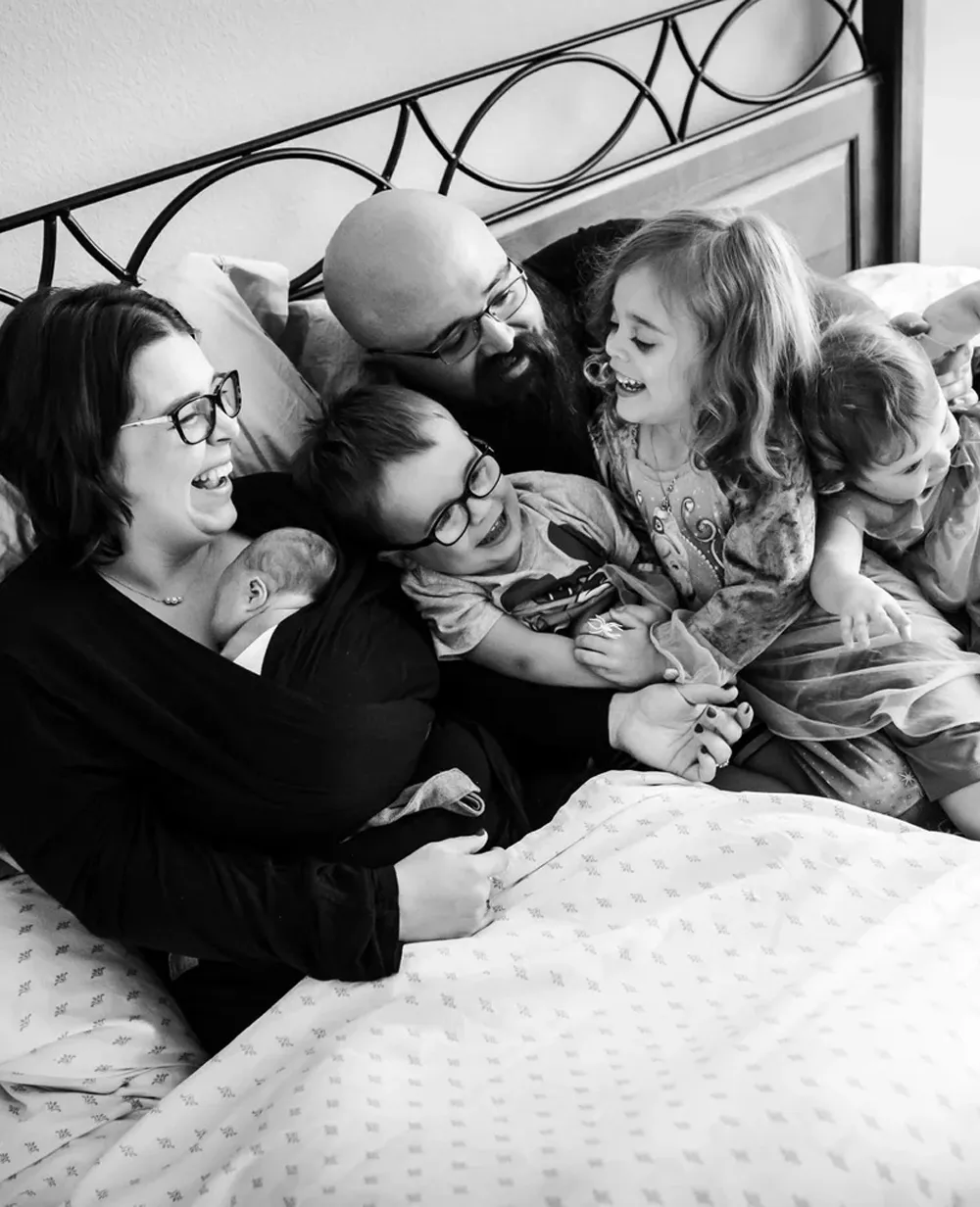 Documentary black and white photo of midwifery care