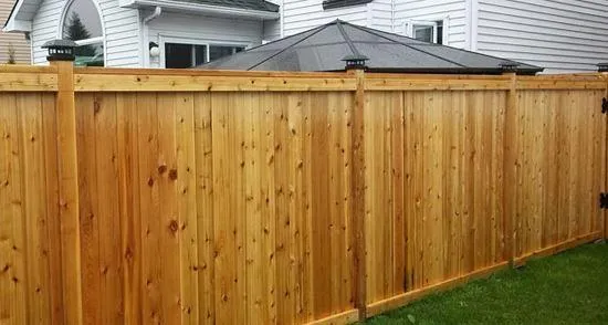 yakima wood fence with a natural stain