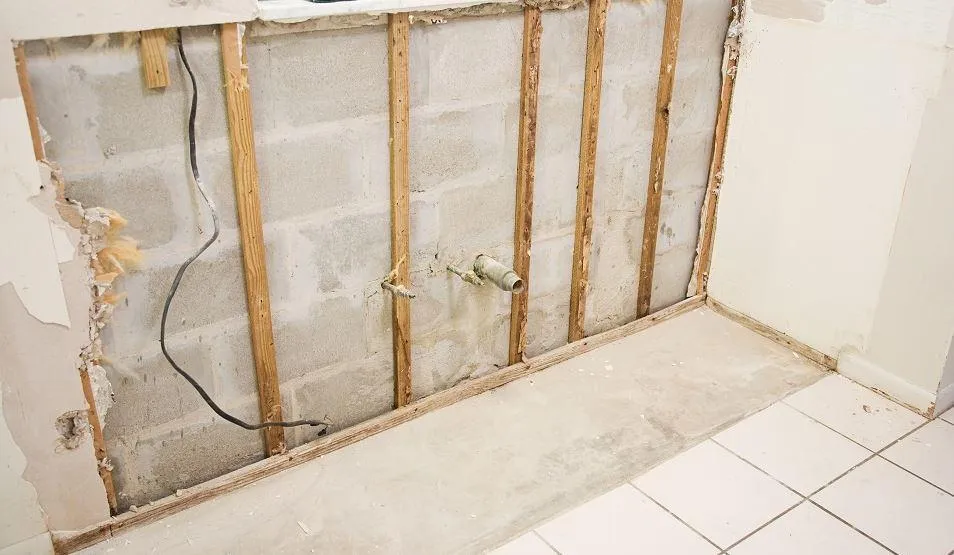 water damage replacing drywall in bathroom in Des Moines