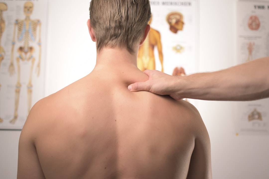 Houston Chiropractor Dr Ennis Shows Back