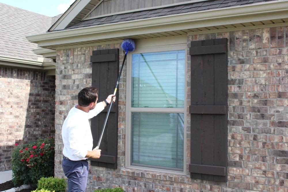 Alder Pest Control servicing a pest control customer in Bentonville, Arkansas