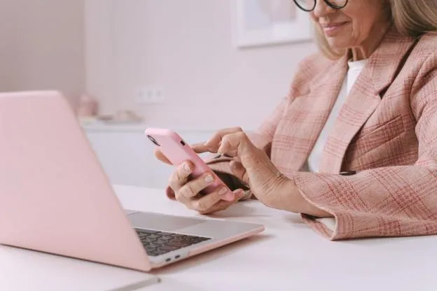 old woman looking at her phone. 