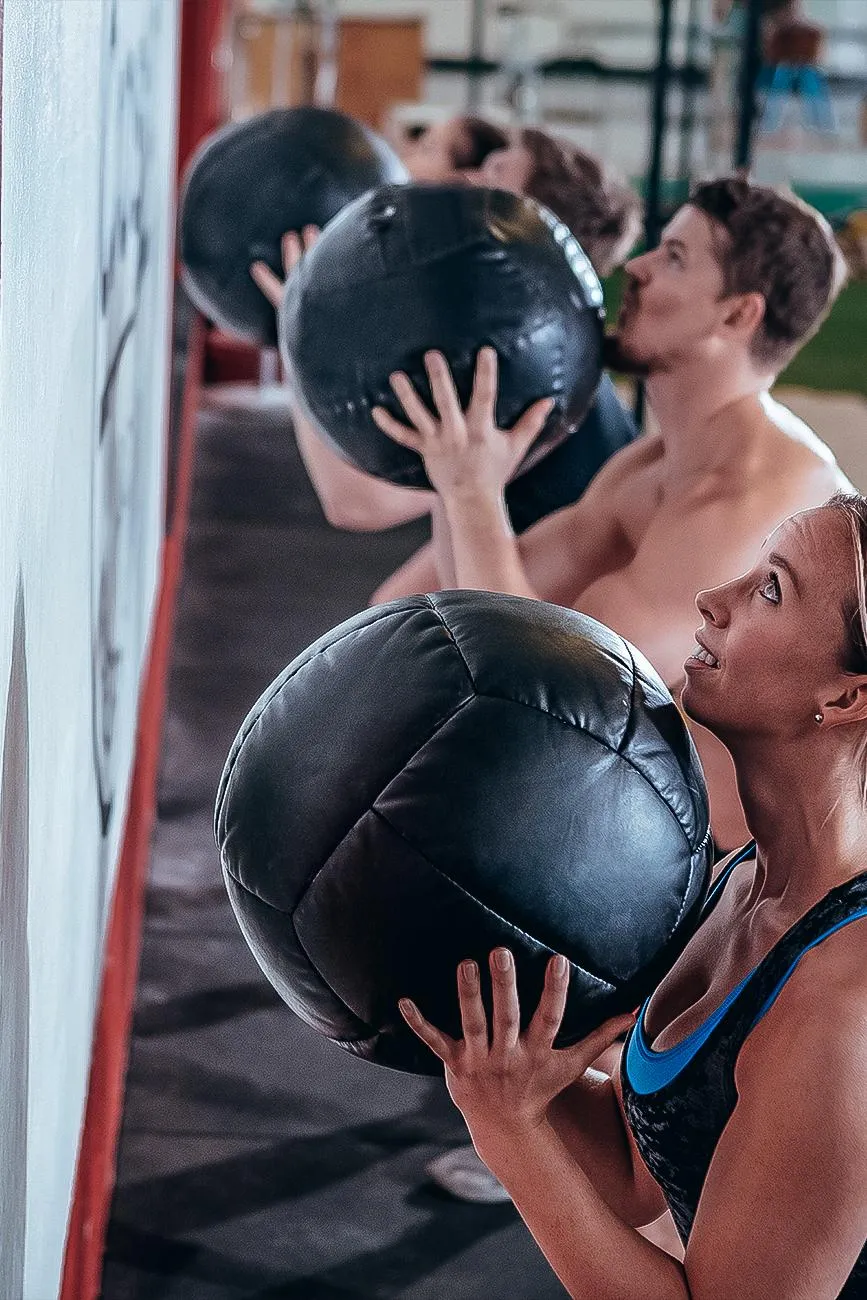 exercising-with-medicine-ball-evolve-fitness