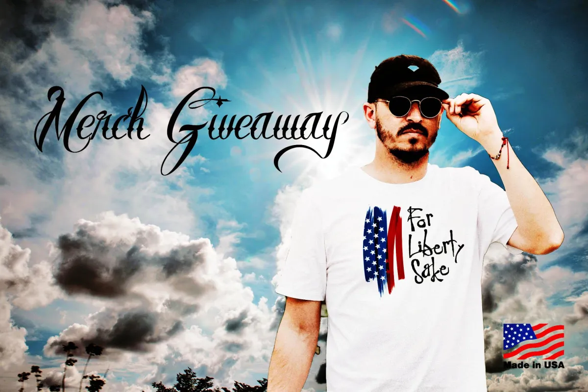 Photo of a man wearing a For Liberty Sake T Shirt. The copy asks you to join our tribe and get 10% off.