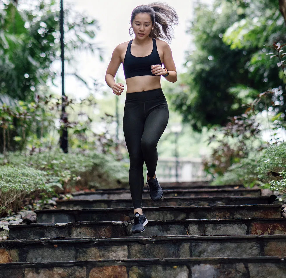 woman running down stairs