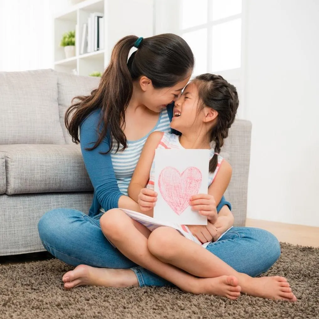 Mom playing with daughter