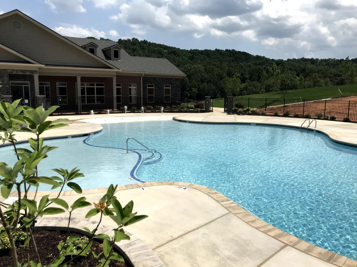 Large neighborhood community pool with beach entry, bubblers, tanning shelf, and multiple points of entry in Hardin Valley Area Knoxville.
