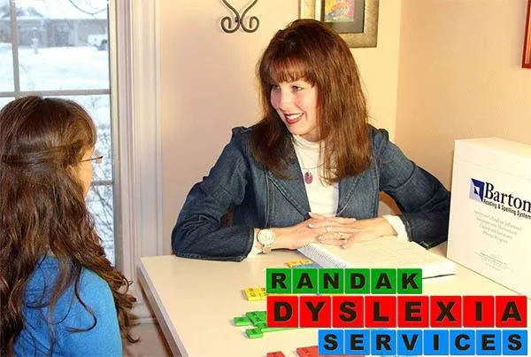 Angie Randak tutoring a dyslexic student how to read and spell.
