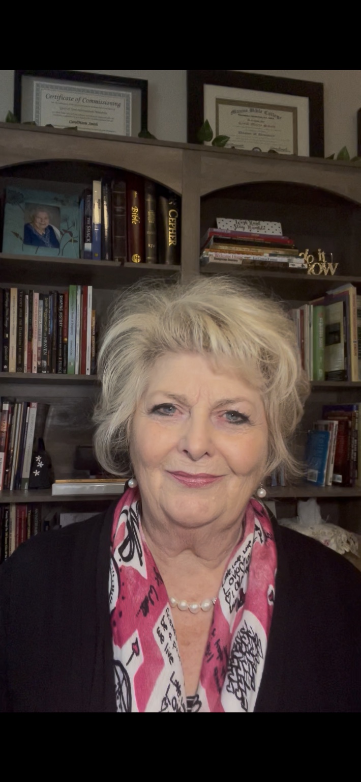 Dr. CarolMarie smiling warmly