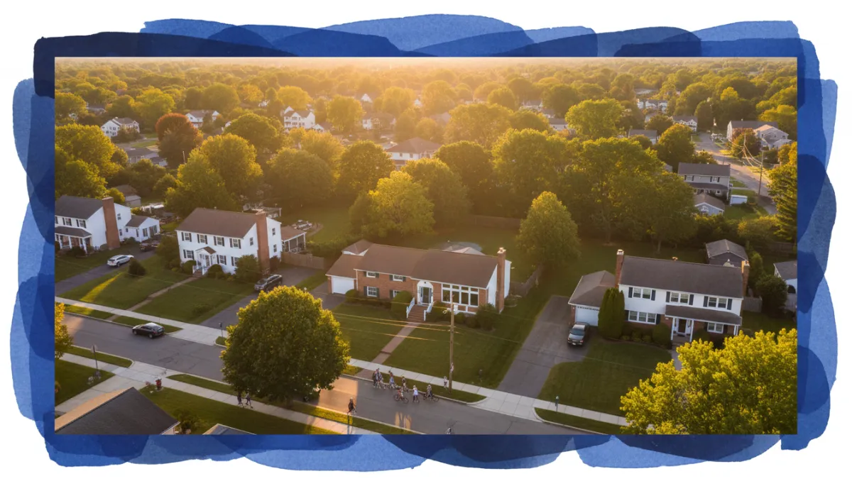 Aerial view of a Connecticut suburban neighborhood with families outside on a summer evening