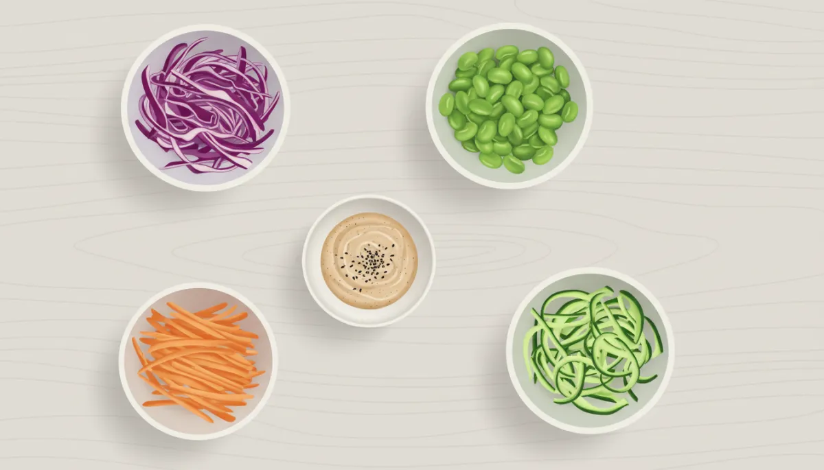 Ingrediënten voor een kleurrijke Aziatische salade netjes uitgestald