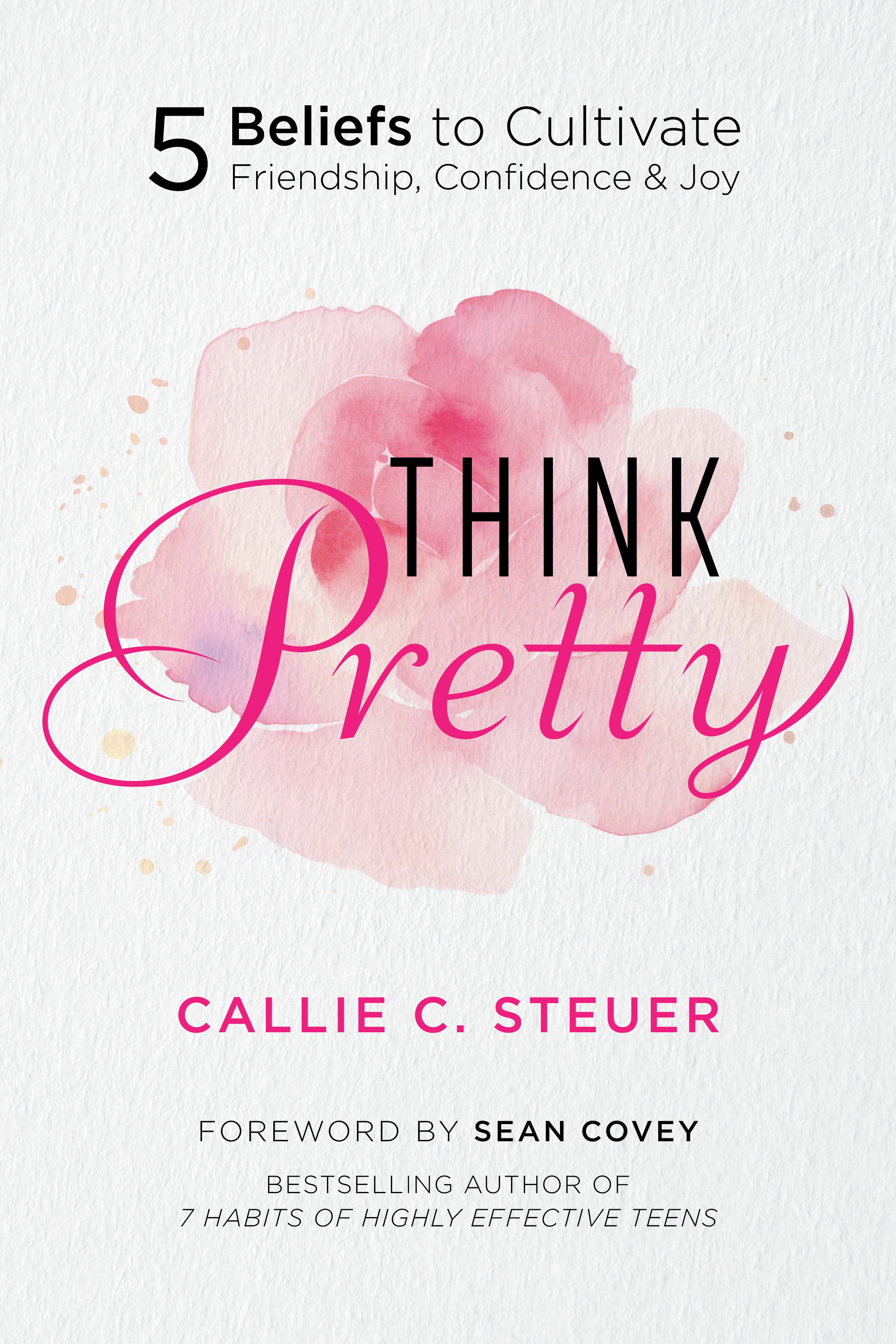 A hardcover book titled 'Think Pretty' with a vibrant pink and gold cover, placed on a white table with a soft-focus background of blooming flowers and sunlight streaming in, evoking warmth and inspiration.