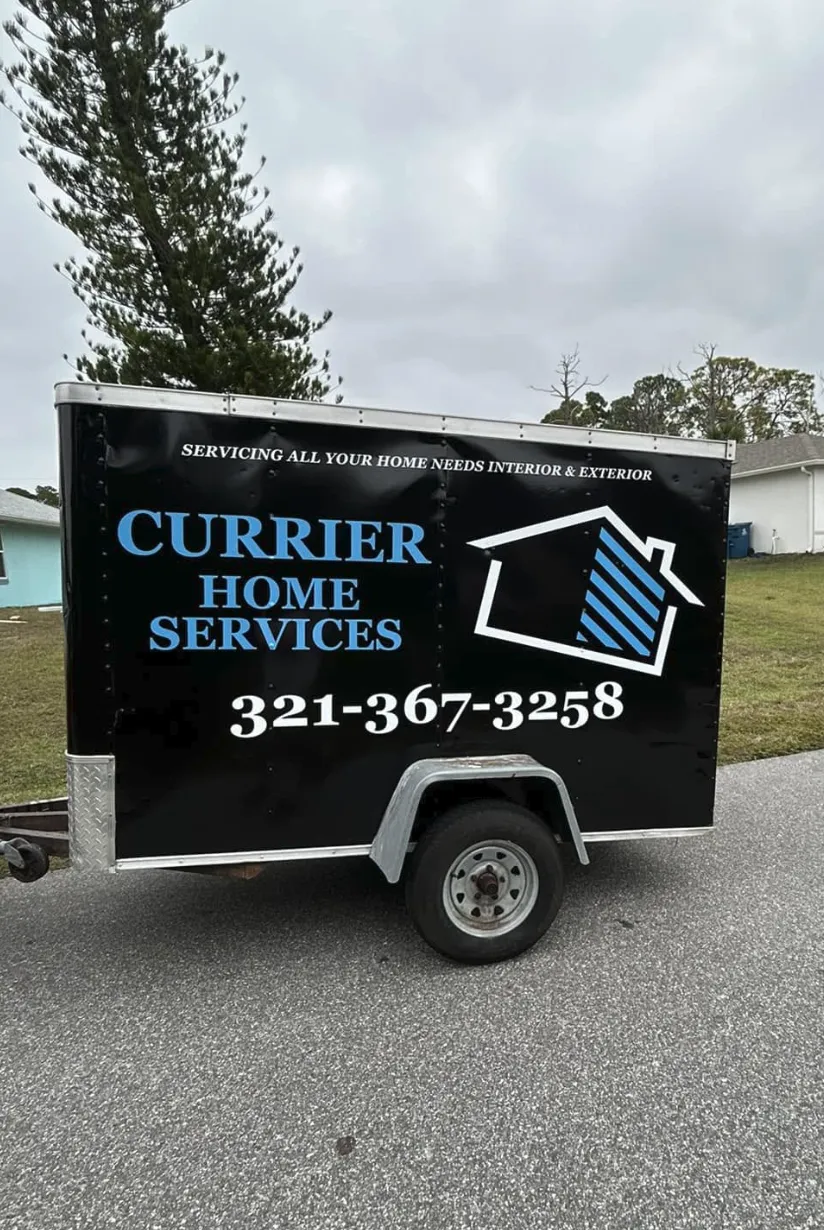 Currier Home Services pickup truck in Palm Bay, Florida; company logo removed; trailer not included; natural background and shadows preserved