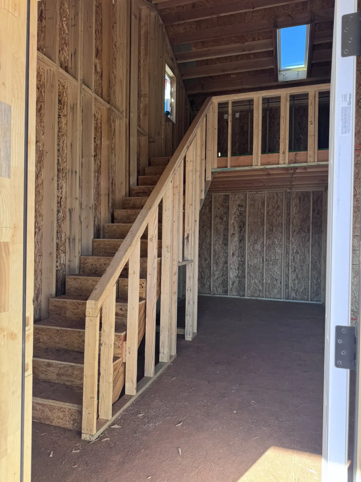 Tiny home interior framing with loft staircase, Flagstaff, Arizona