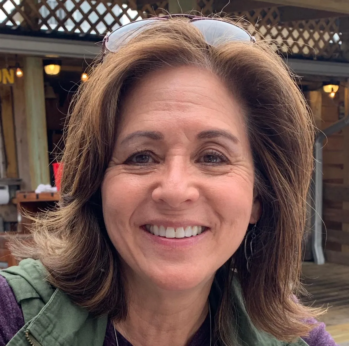 Vera smiling warmly, reflecting her joy and kindness