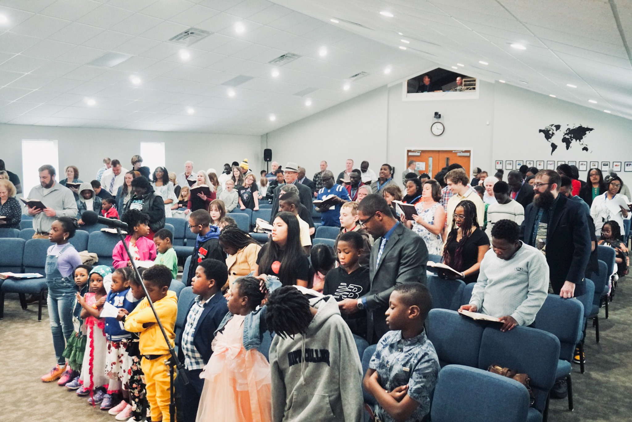 Congregation singing during worship service (Powerful Music)