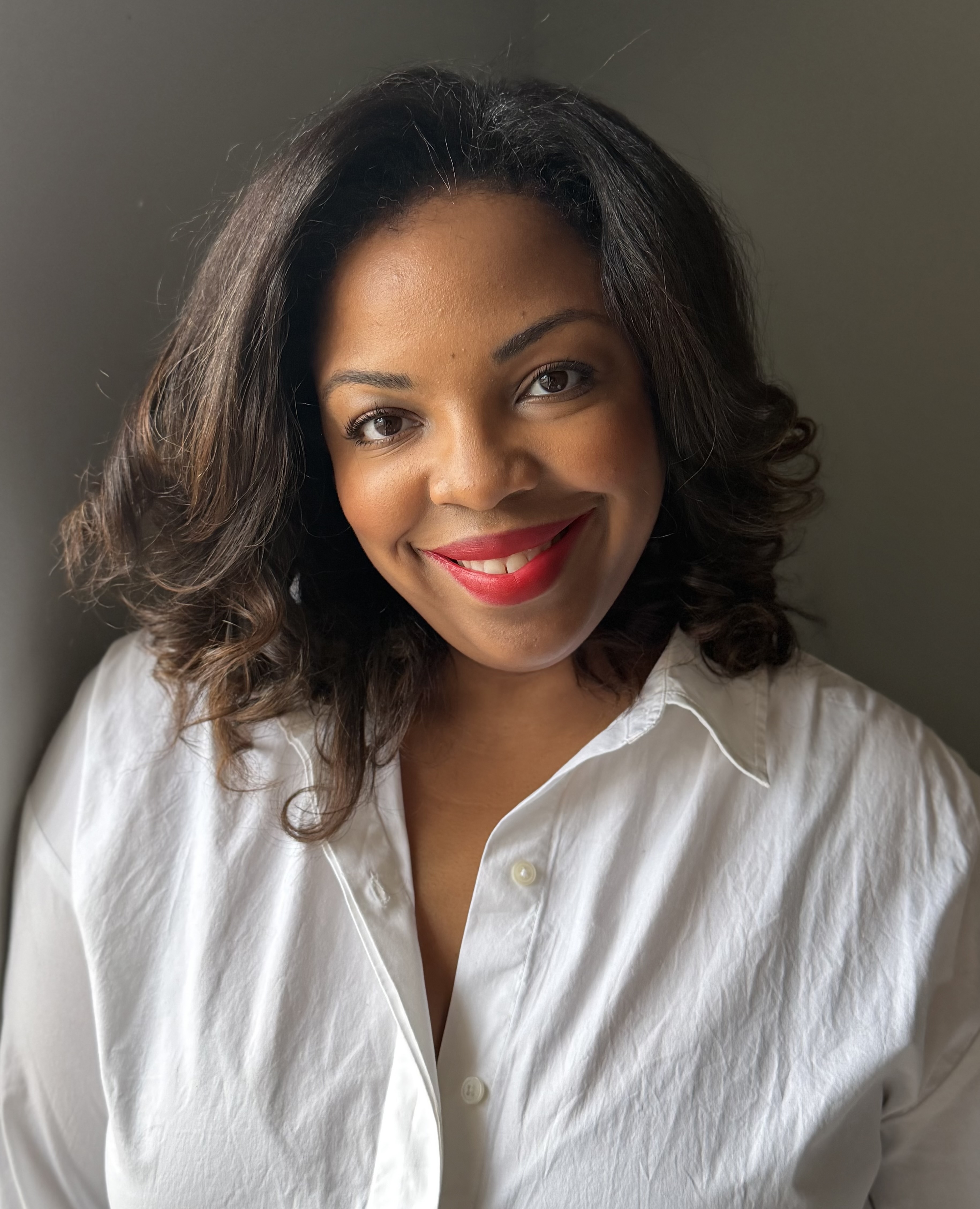 Andrea Bryant, host of The Well Room, a podcast for women who carry everything