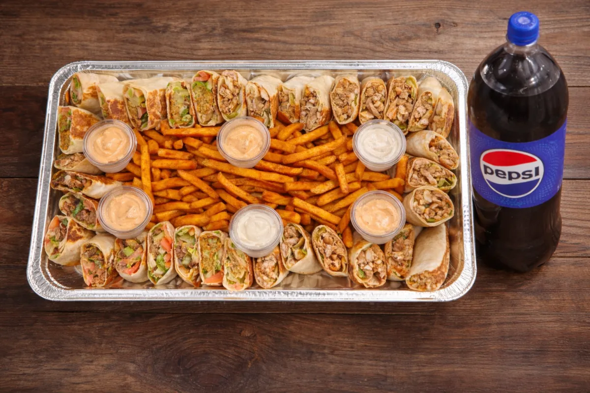 Town Kitchen catering trays and boxed halal lunches arranged for an office meeting