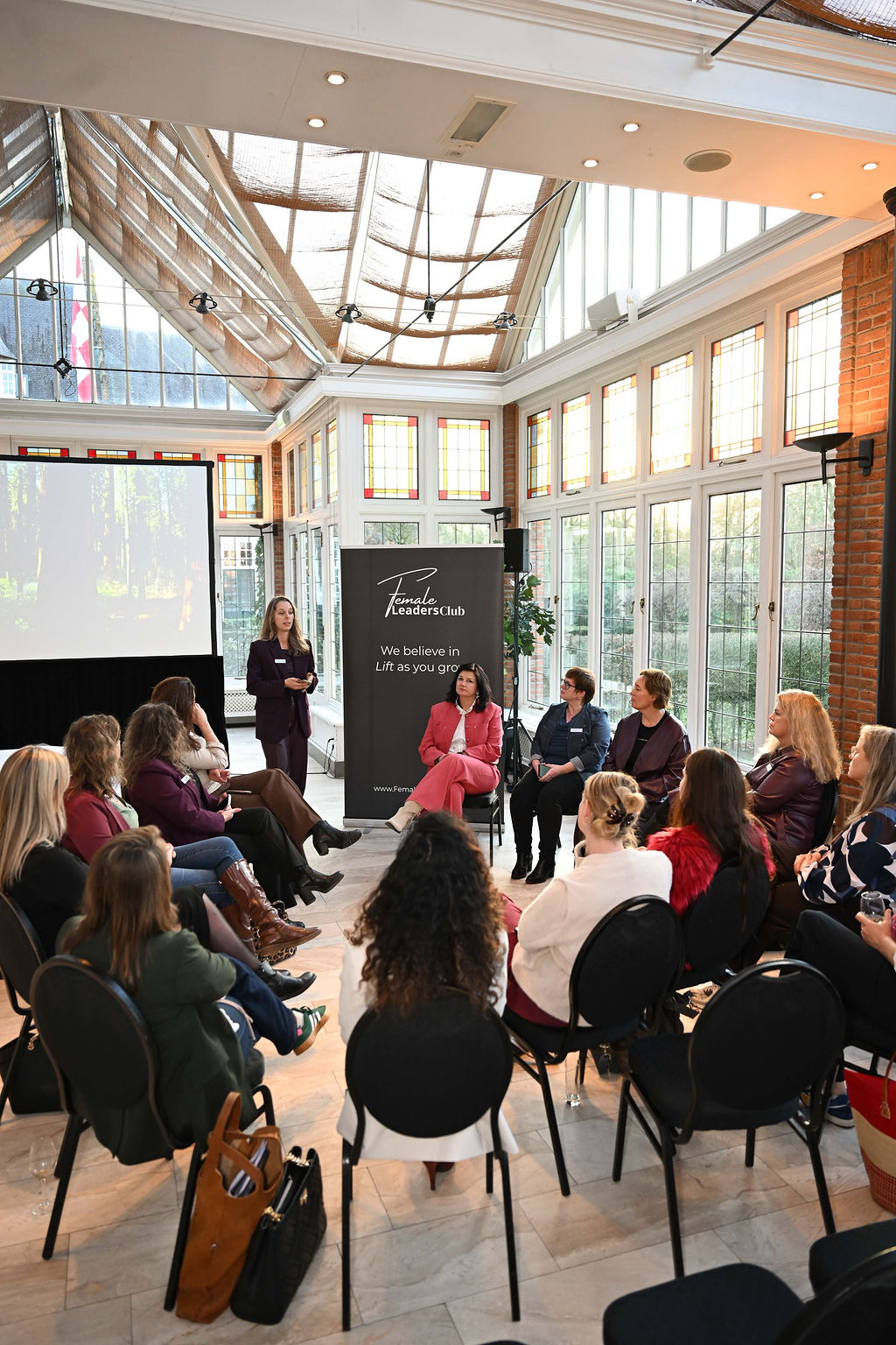 Women connecting at Female Leaders Club leadership event