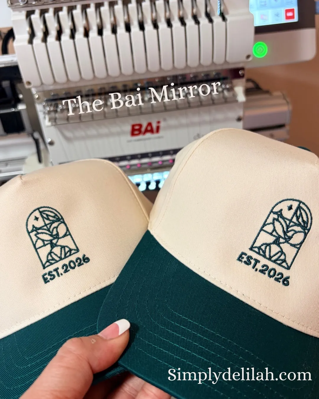 Multiple structured caps showcasing precision commercial embroidery finished on BAI Mirror