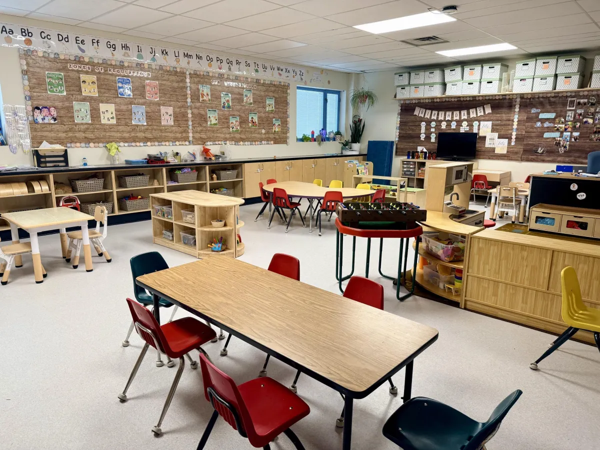 Children learning and playing in a welcoming childcare environment.