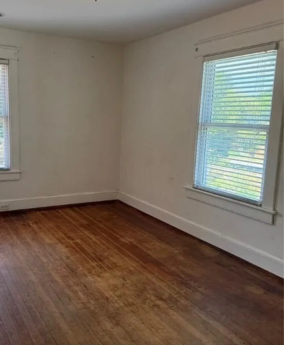 Bedroom with hardwood floors