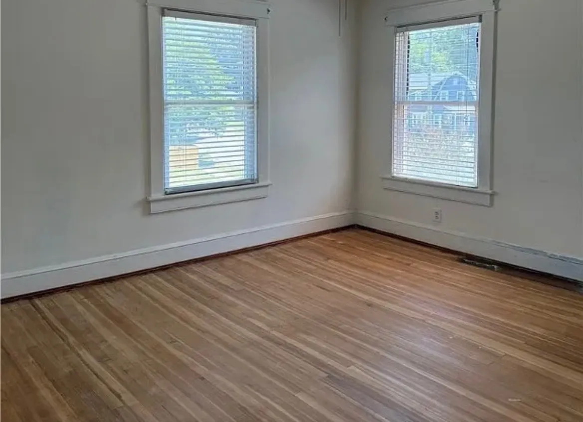 Bedroom with two windows