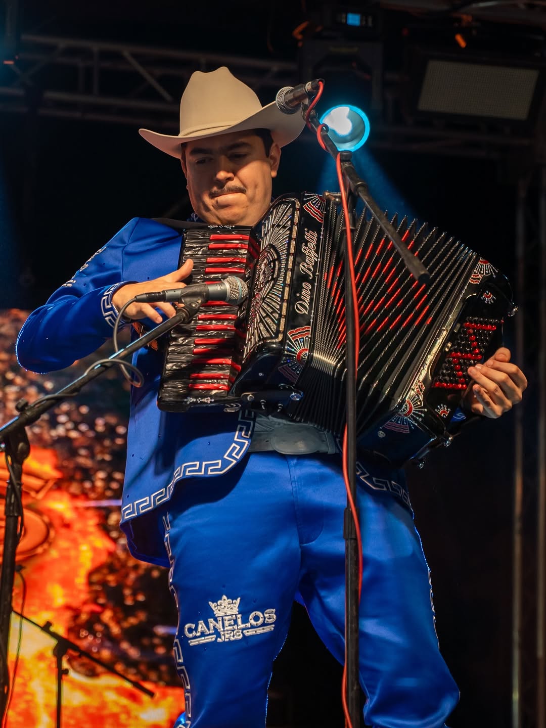 Vendors engaging with attendees at MMG concert