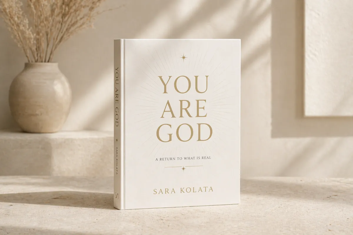 The Source Frequency Book mockup on cream background