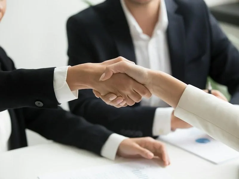 Handshake between home buyer and homeowner in Northern Virginia