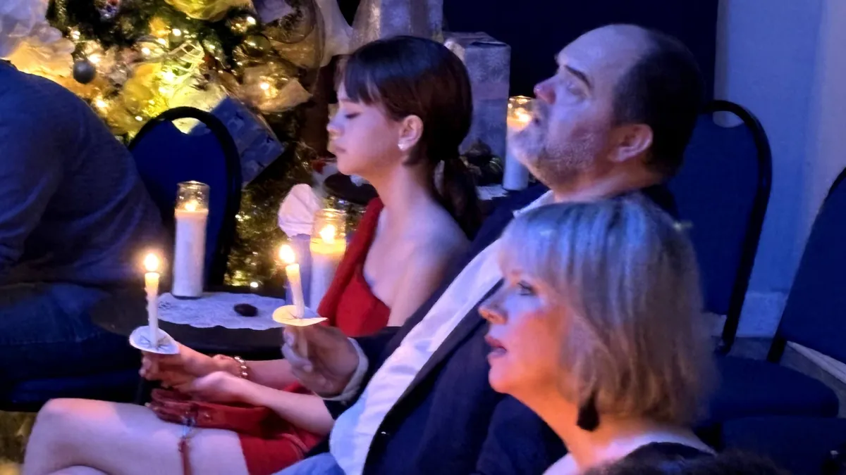 Christmas Eve Service - Attendees holding candles