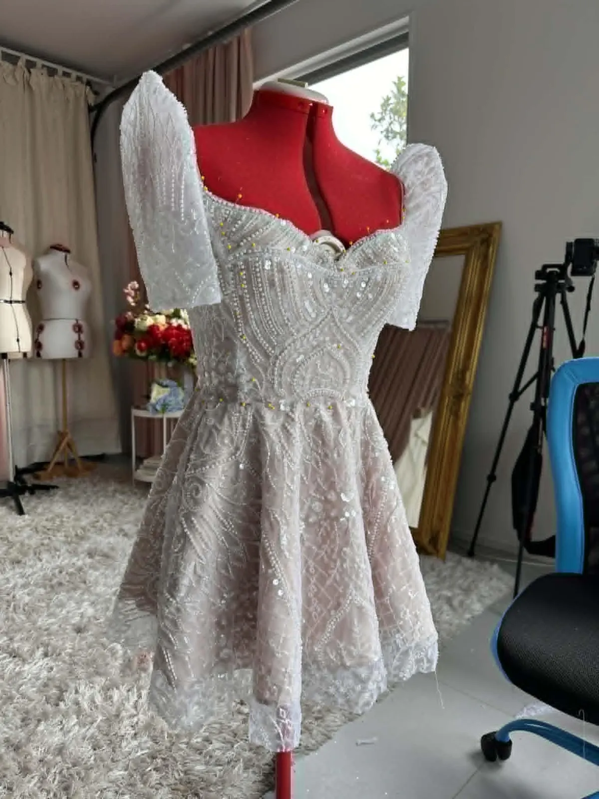 A finished custom Filipiniana wedding dress on a real MGC bride