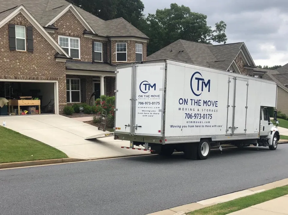 On The Move moving truck and team