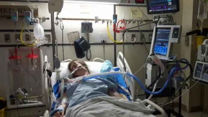 Amanda in a hospital room