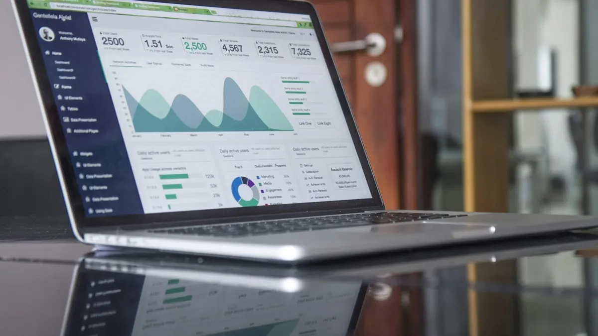 Contractor reviewing Meta Ads performance metrics on laptop