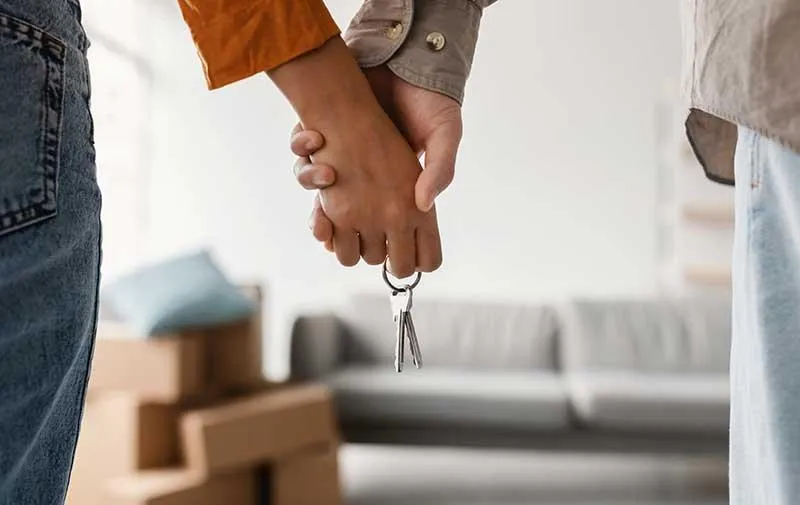 Homebuyers holding keys