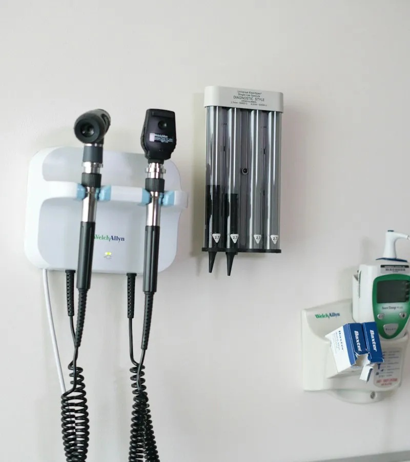 Medical diagnostic tools mounted on a wall in a Fairfax County clinic