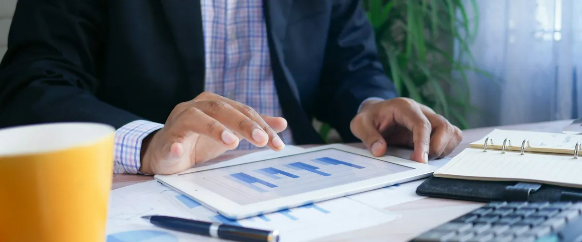 Confident small business owner reviewing financing options