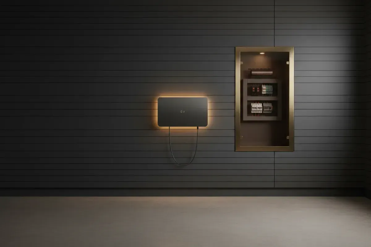 Sleek architectural home interior with upgraded safety switchboard and wall-mounted EV charger
