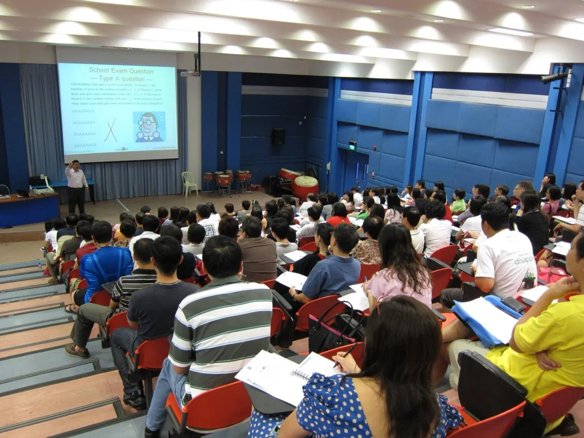Dr Norman Tien facilitating a mathematics learning workshop for parents
