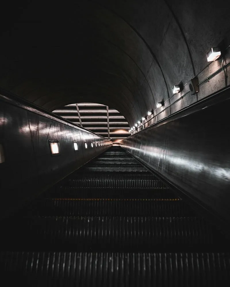 Metro train arriving at a station platform serving the Arlington, VA corridor