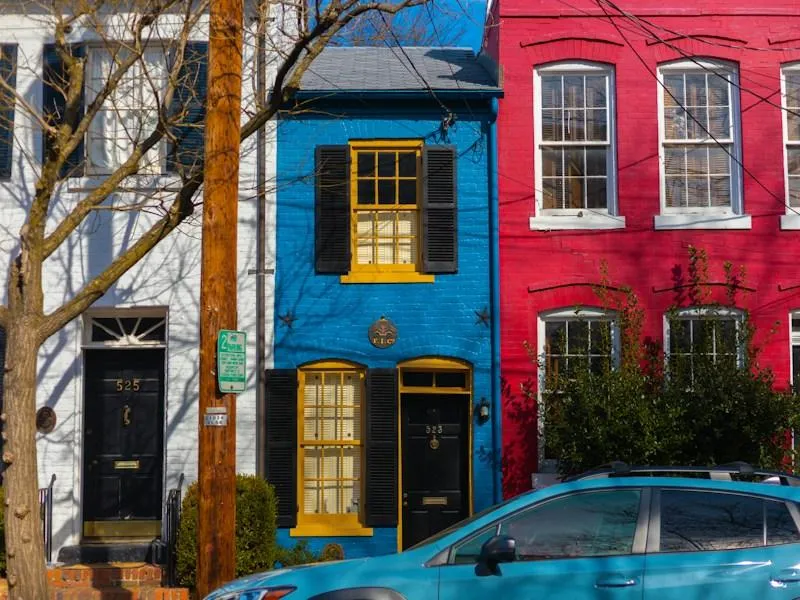 A row of colorful houses along a Del Ray street