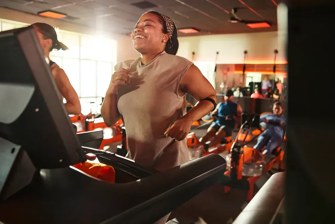 Woman running on a treadmill.