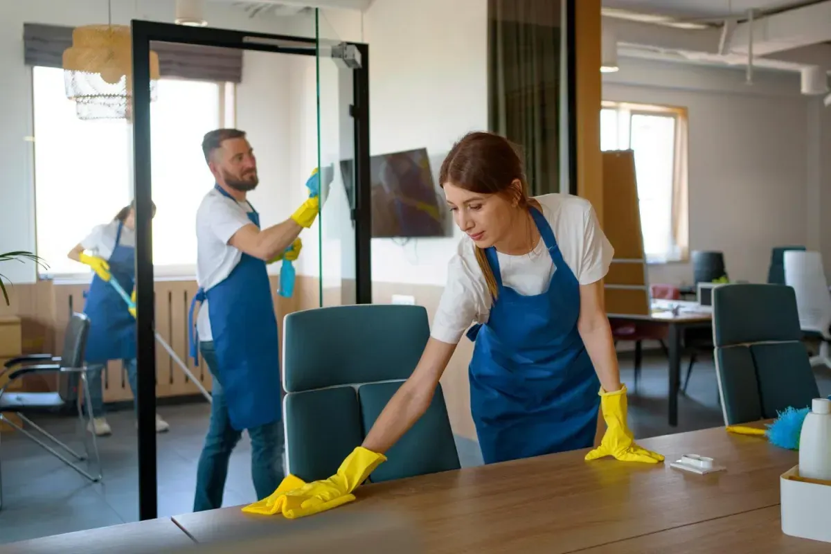 Commercial janitorial professional cleaning an office