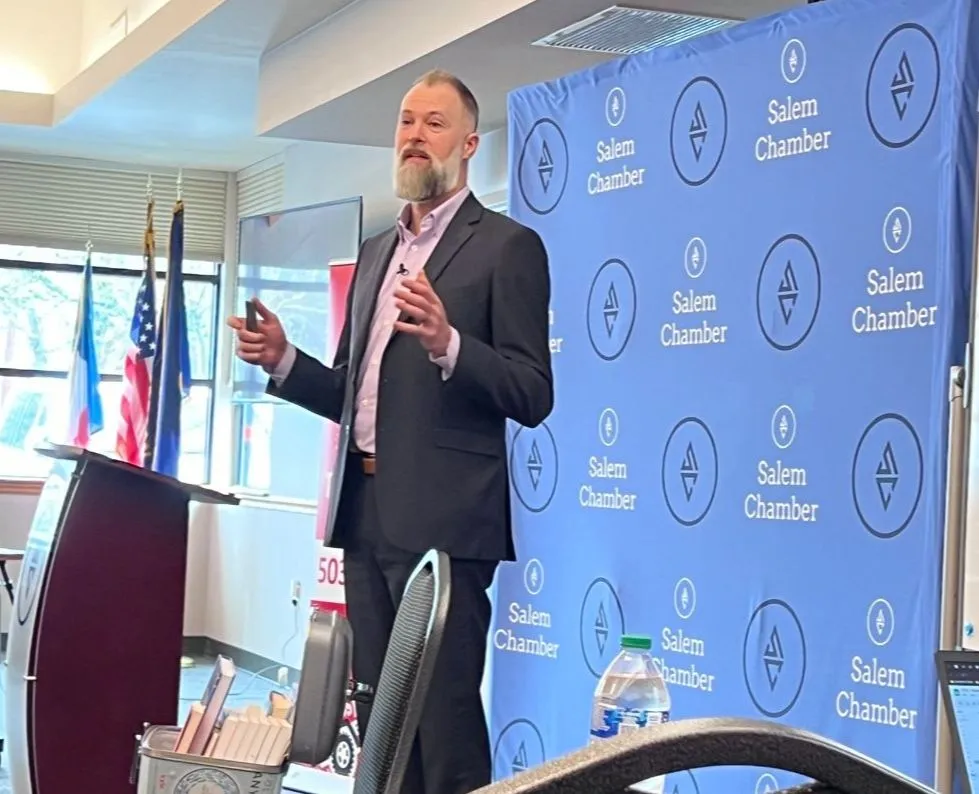 Kyle Sexton speaking at a chamber workshop event