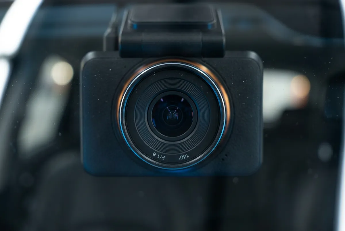 Front and rear dual-channel 4K dash camera cleanly hardwired behind rearview mirror