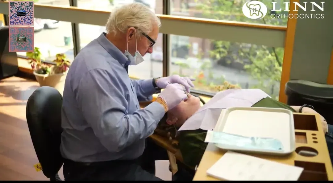 Dr Linn treating a patient