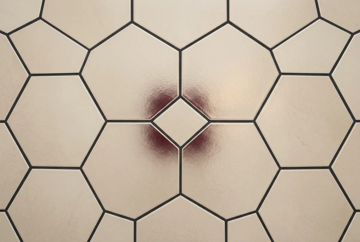 Detail of luxury large-format porcelain tile installation with precise grout spacing
